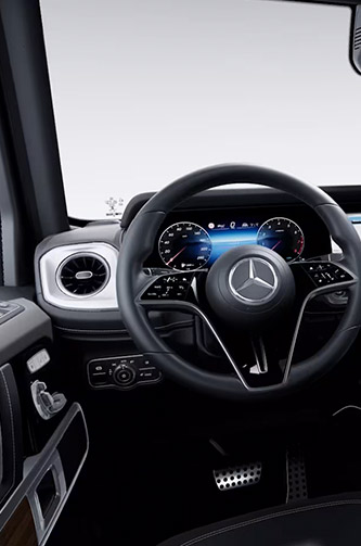 Enterijer Mercedes G-Klase sa volanom i digitalnom instrument tablom